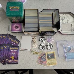 Pokemon Trading Card Collection with Tins and Accessories